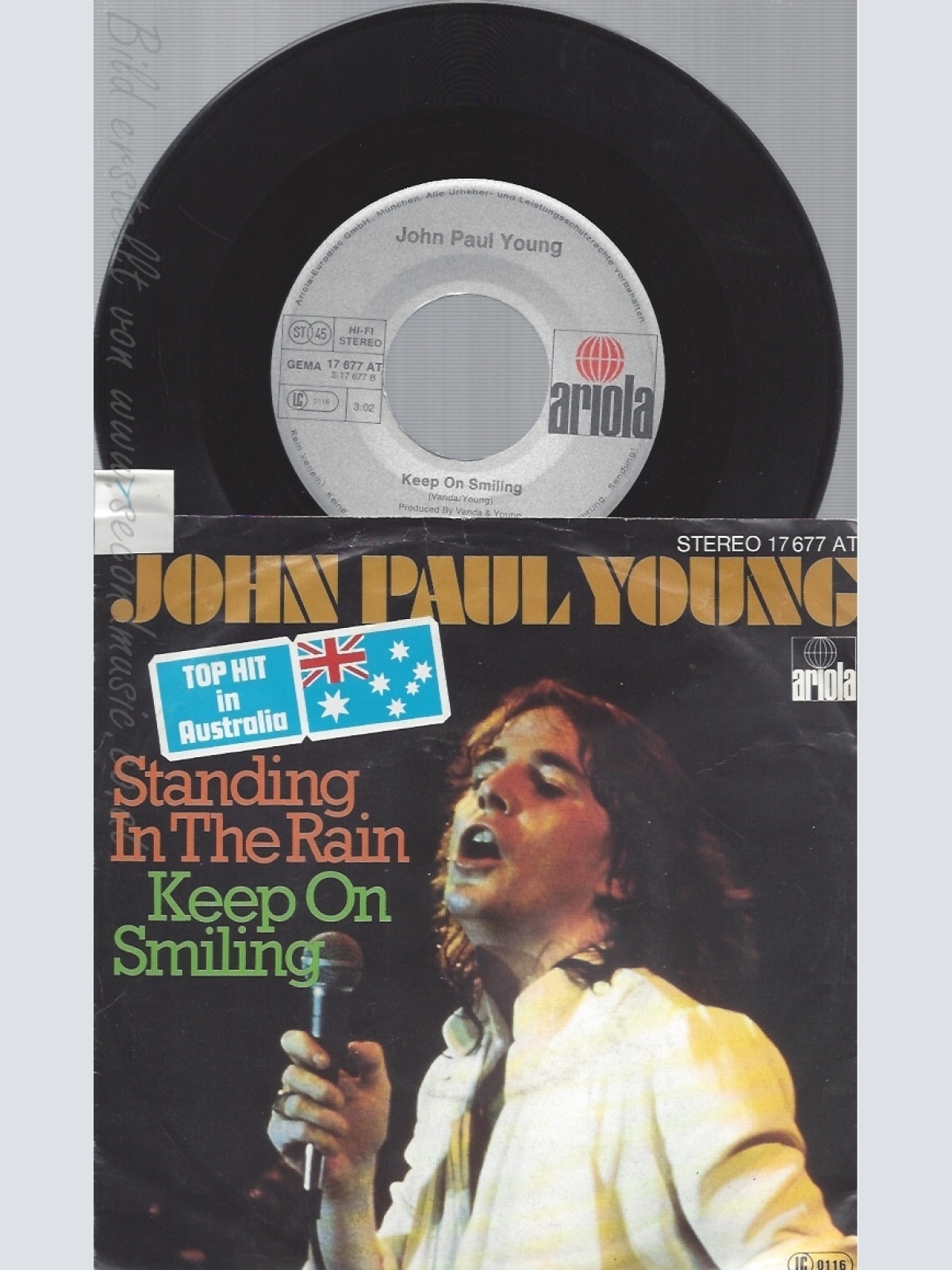 7" JOHN PAUL YOUNG --STANDING IN THE RAIN