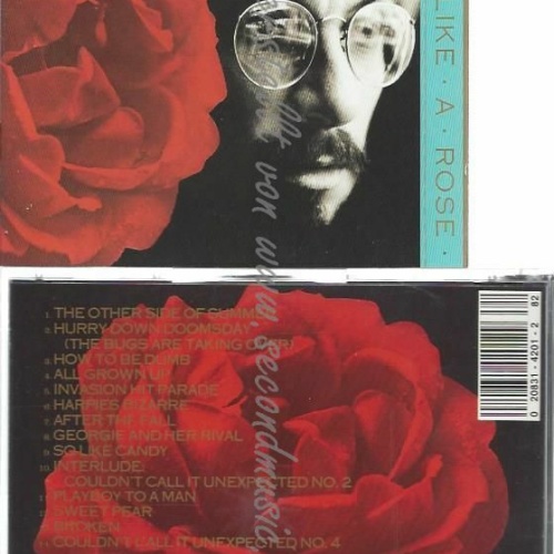 CD--ELVIS COSTELLO--MIGHTY LIKE A ROSE