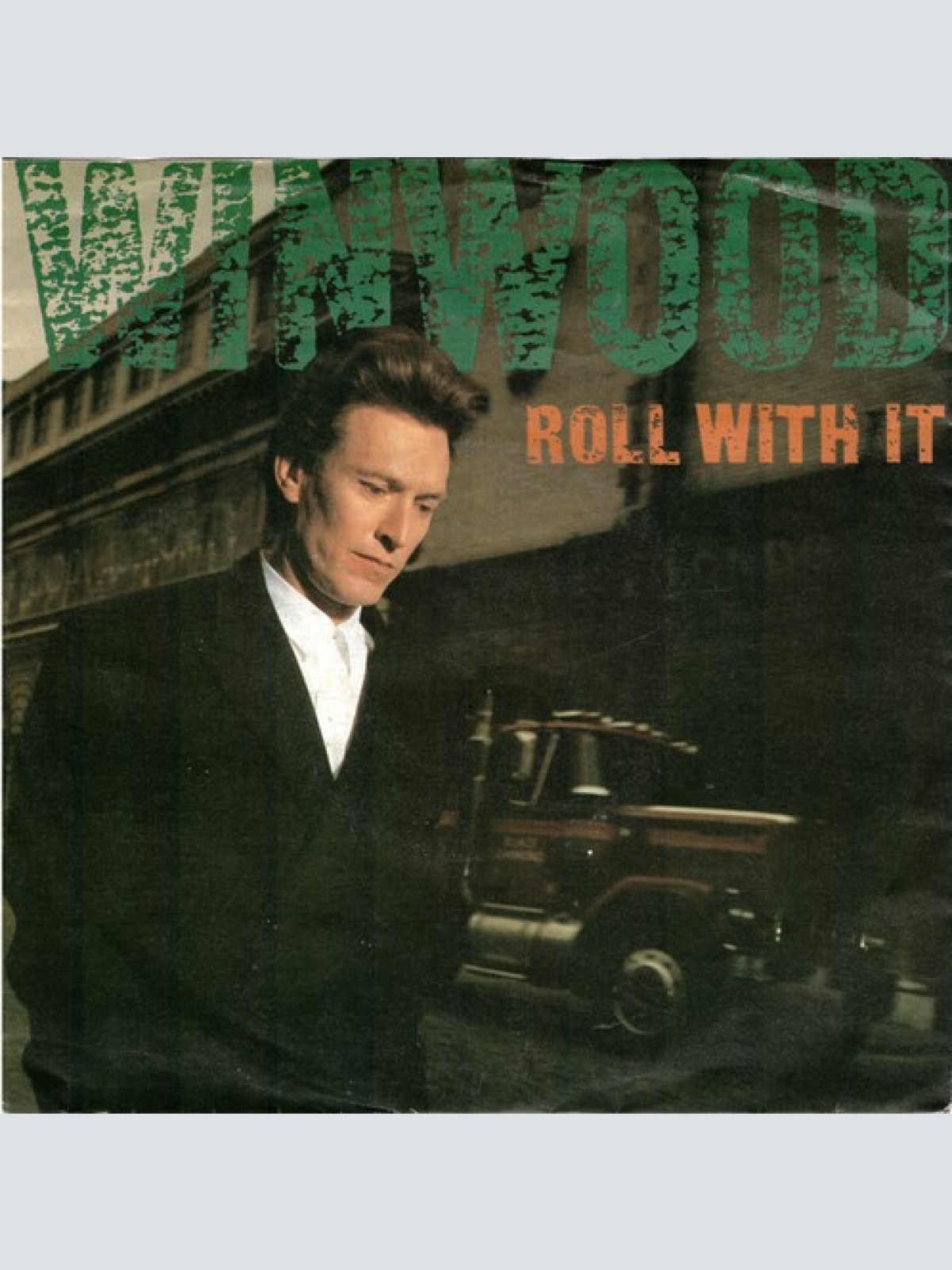 7", Single Steve Winwood - Roll With It